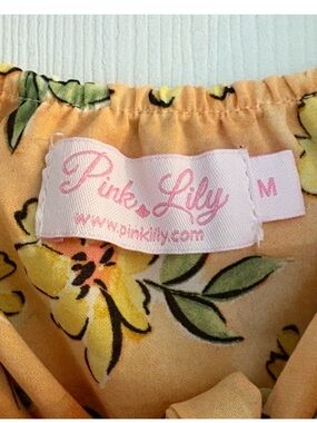 Pink Lily Yellow Floral Blouse with Pink Logo Label